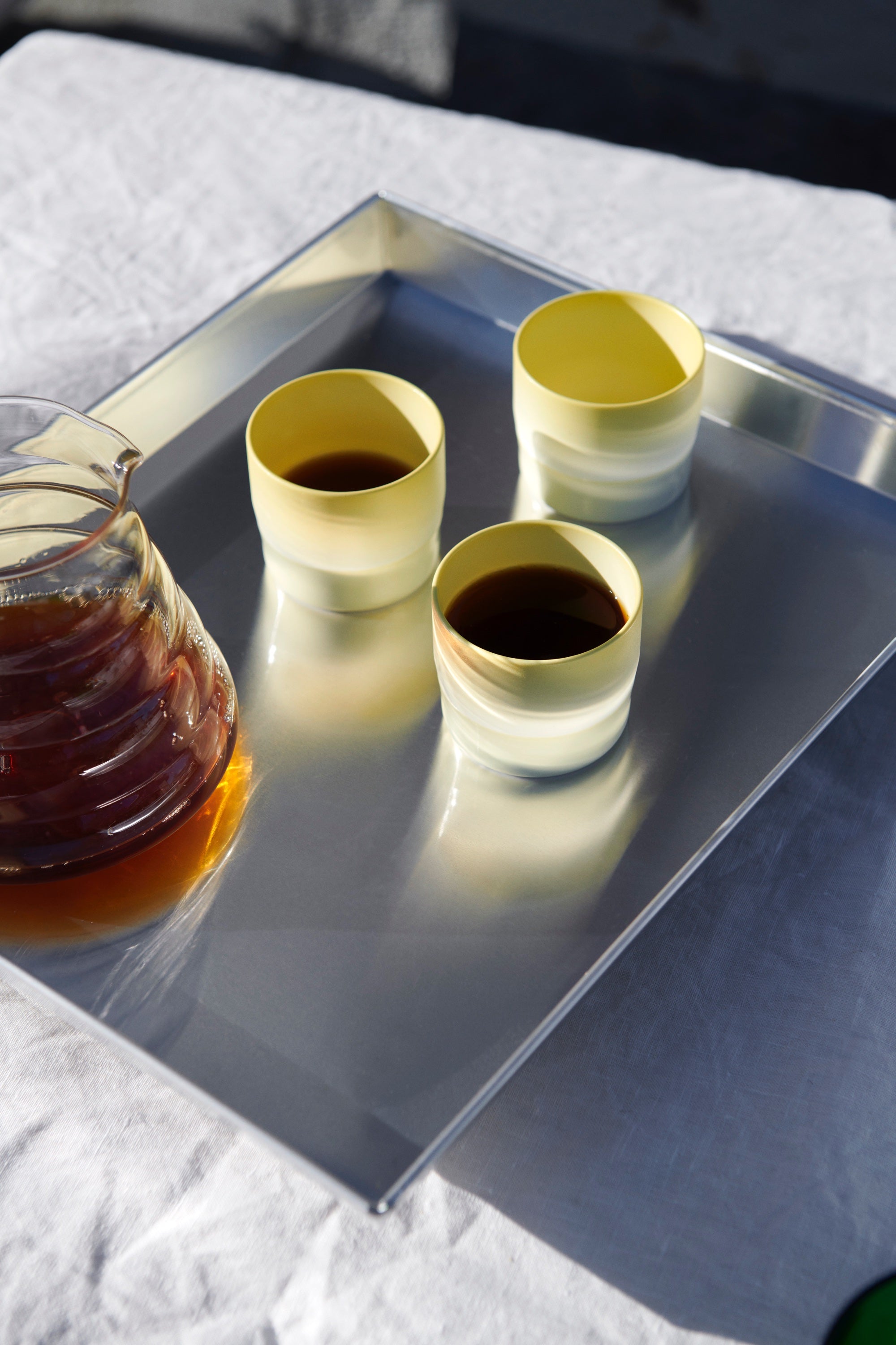 S&B Colour Porcelain cups by 1616 arita japan on a metal tray