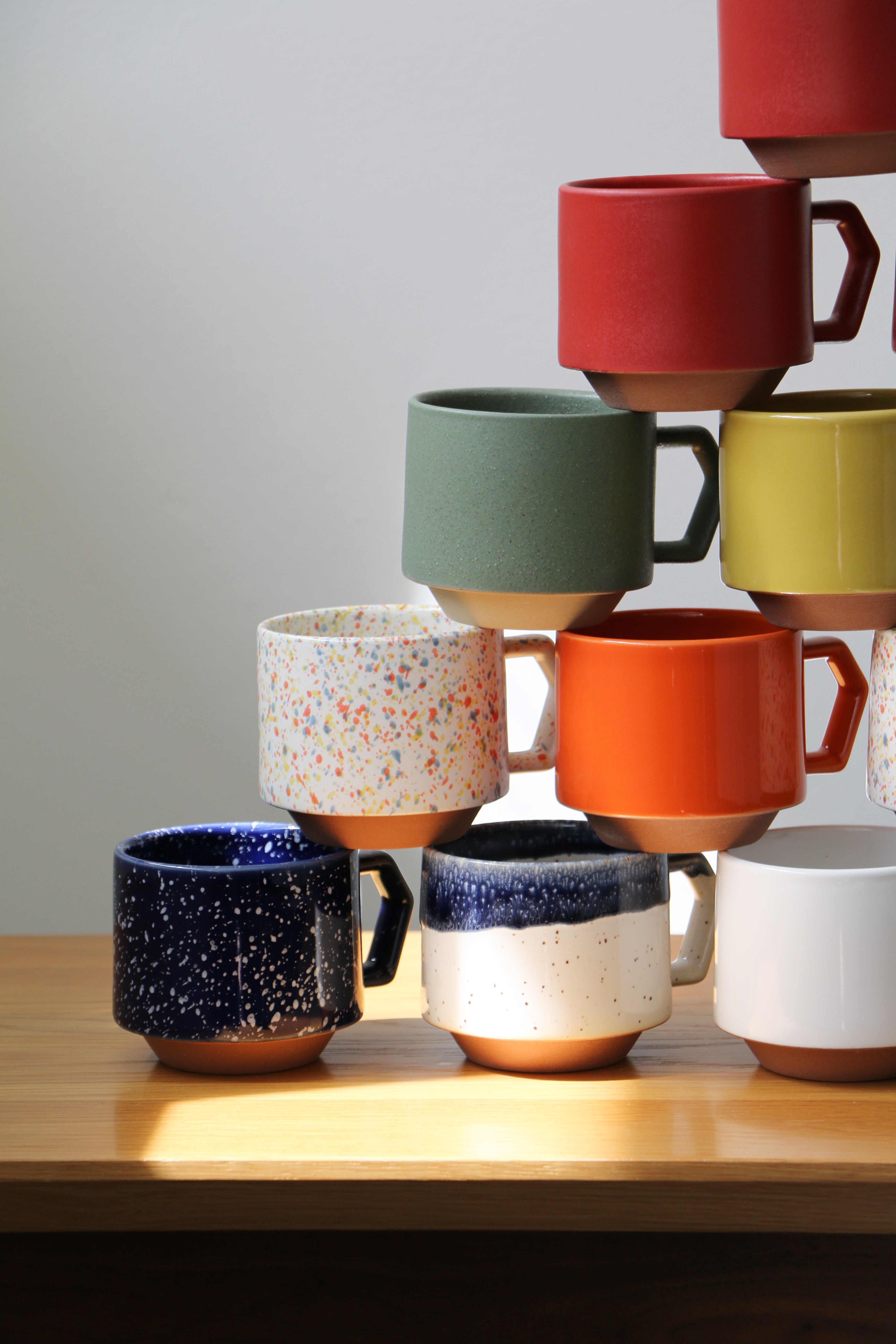 Chips Japan mugs showing different colours, glazes and handle forms