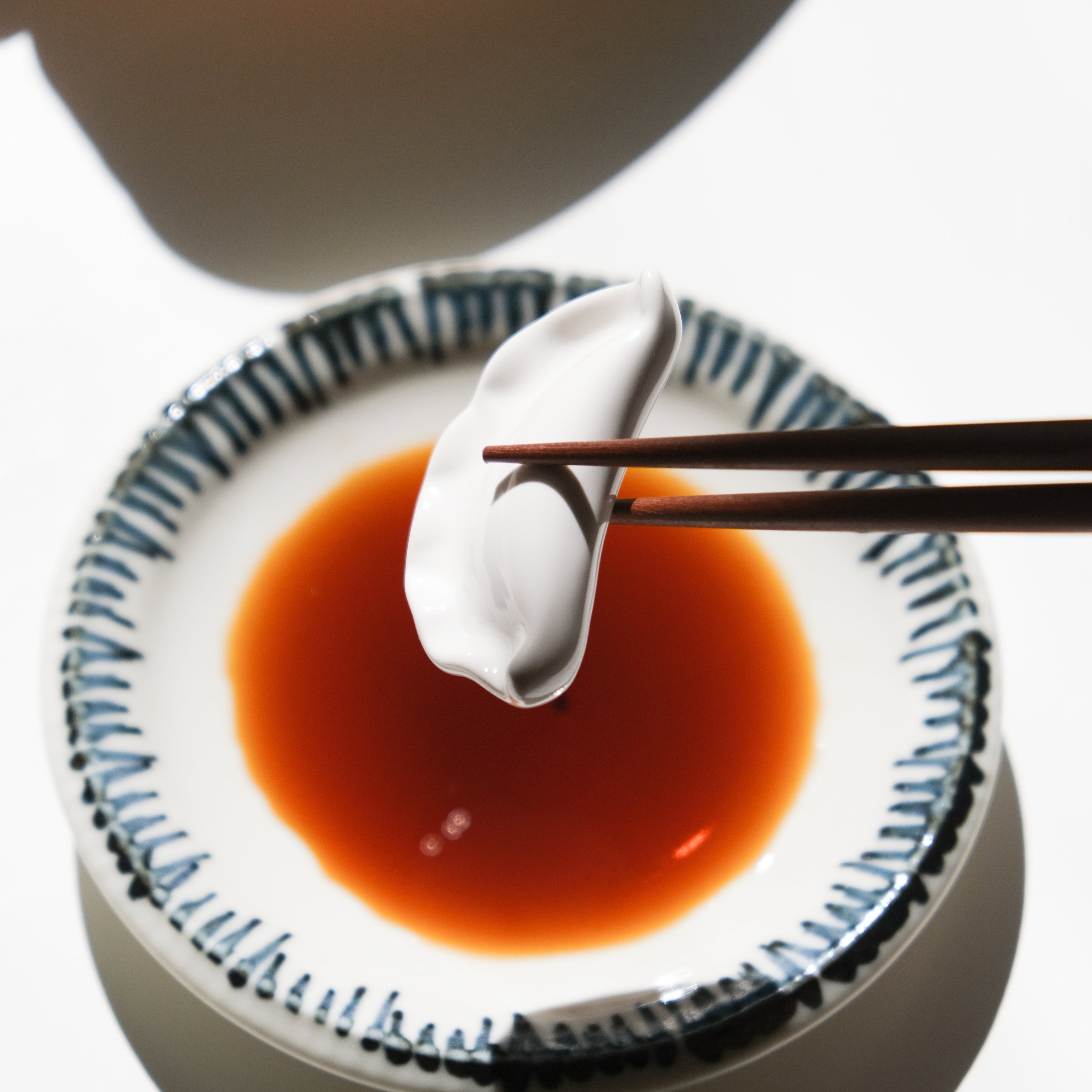 A Freaking Dumpling Chopstick Holder